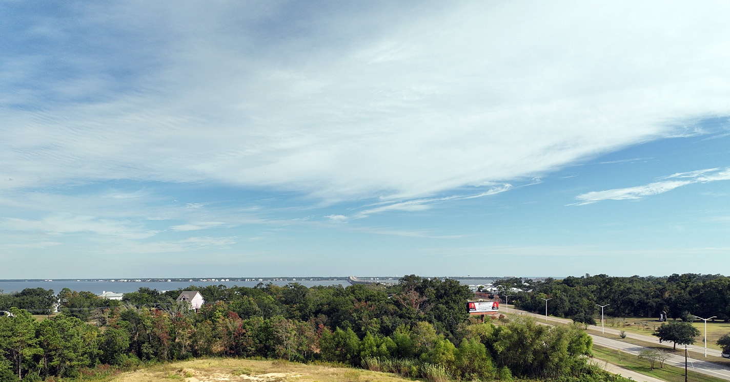 Aerial view of the 48± acre property along Highway 90 in Bay St. Louis, Mississippi